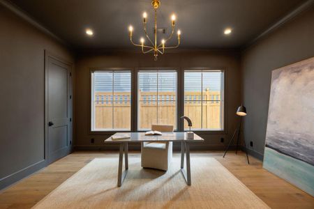 French doors lead you to this large first floor study with walk-in closet.