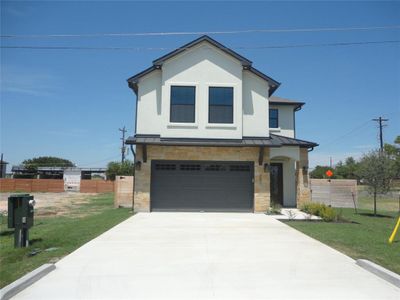 New construction Single-Family house 301 W Lane Ave, Manor, TX 78653 - photo 0