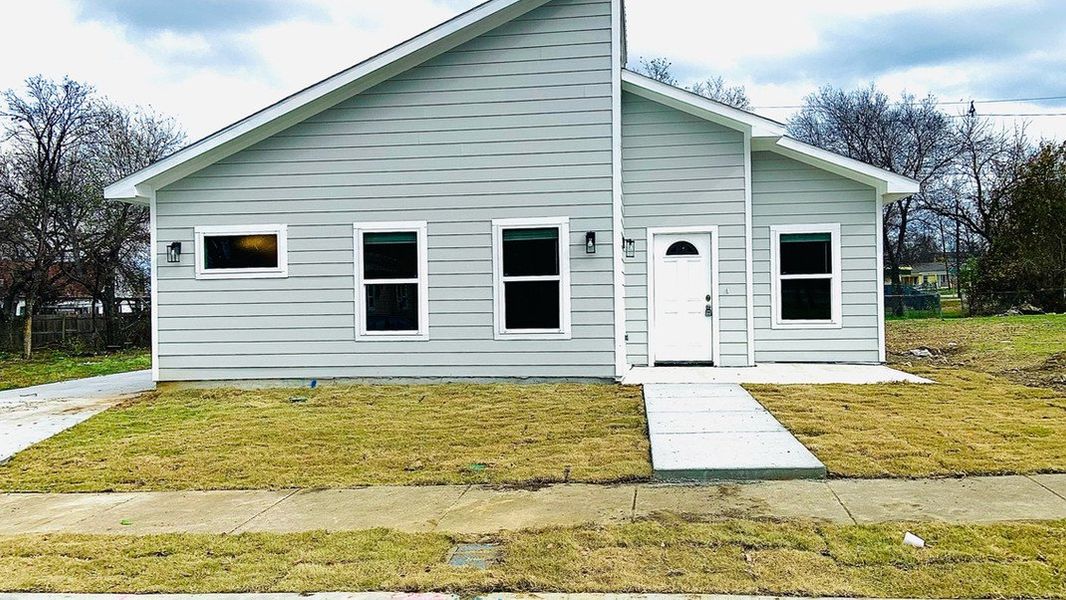 A showcase of a new construction home by Alpha Family Group, highlighting their design and quality (Image 6).