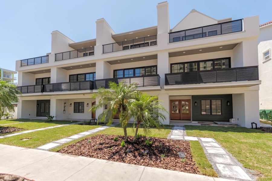 A showcase of a new construction home by Benchmark Commercial Group, highlighting their design and quality (Image 2).