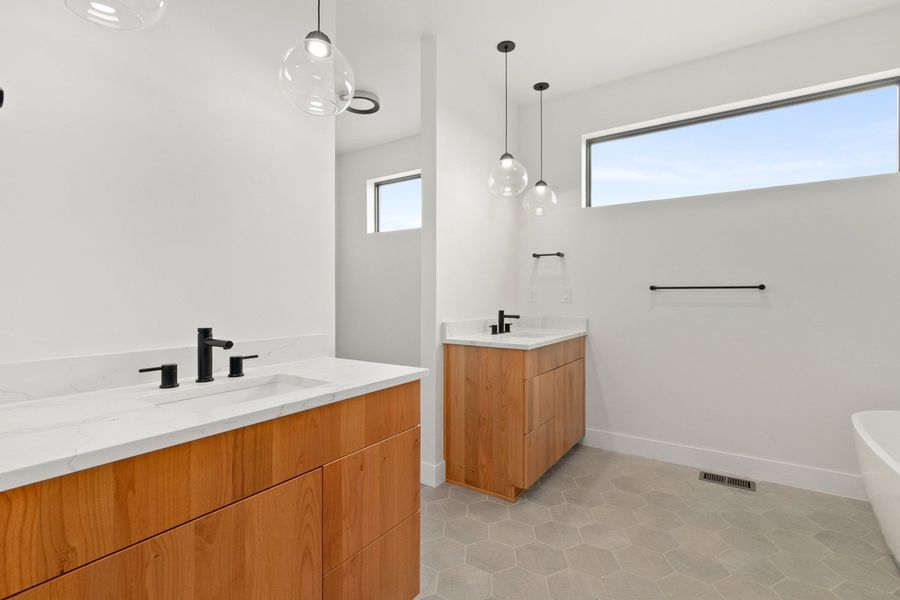 A showcase of a new construction home by New Vision Development Partners, highlighting their design and quality (Image 6).