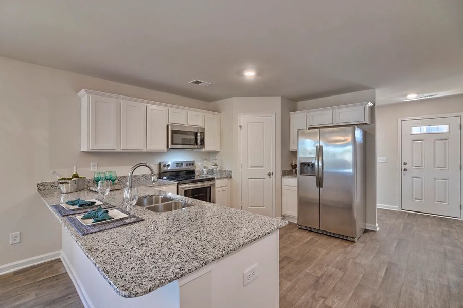 A showcase of a new construction home by McGuinn Homes, highlighting their design and quality (Image 9). A showcase of a new construction home by McGuinn Homes, highlighting their design and quality (Image 9).