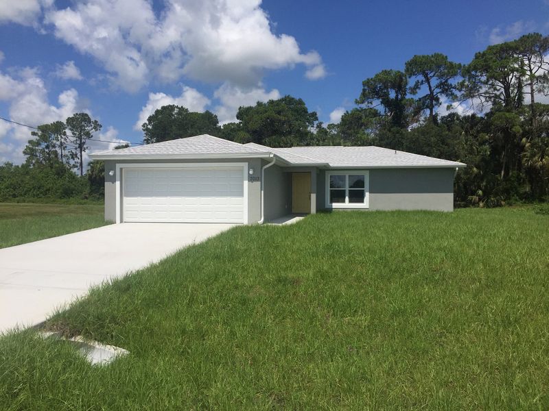 A showcase of a new construction home by Heartland Homes of Florida, highlighting their design and quality (Image 4).