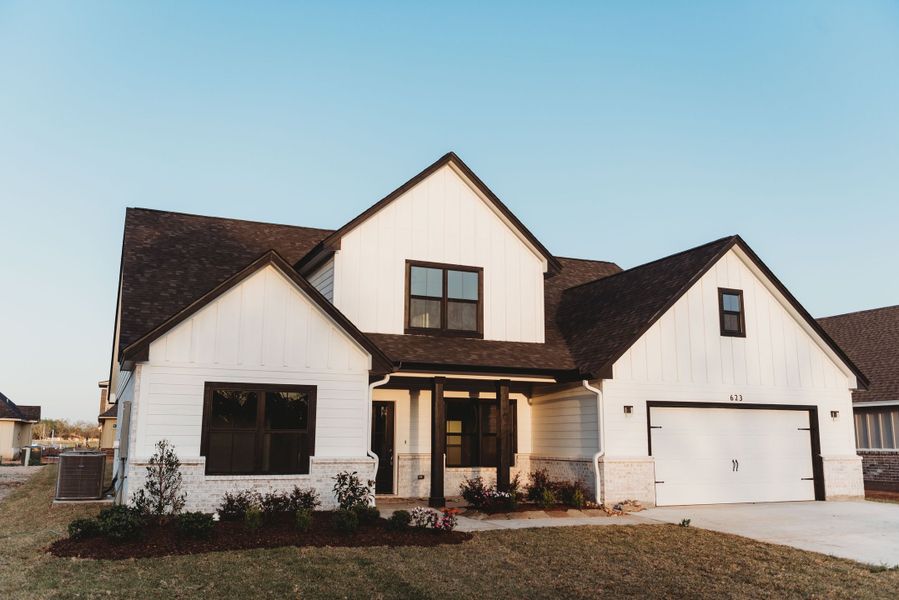 A showcase of a new construction home by Heritage Custom Home, highlighting their design and quality (Image 13).