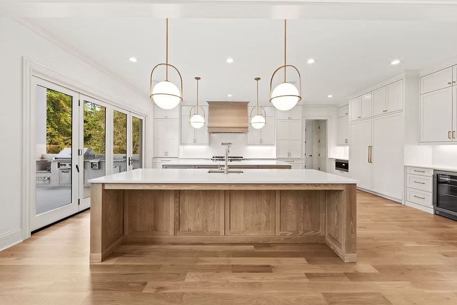 A showcase of a new construction home by Hyde Park Homes, Inc., highlighting their design and quality (Image 5).