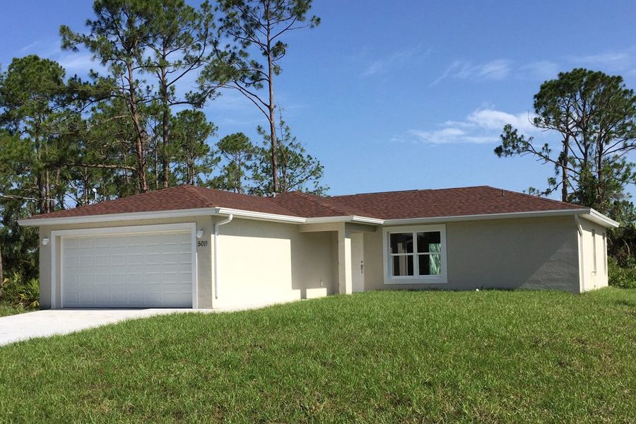 A showcase of a new construction home by Heartland Homes of Florida, highlighting their design and quality (Image 5).