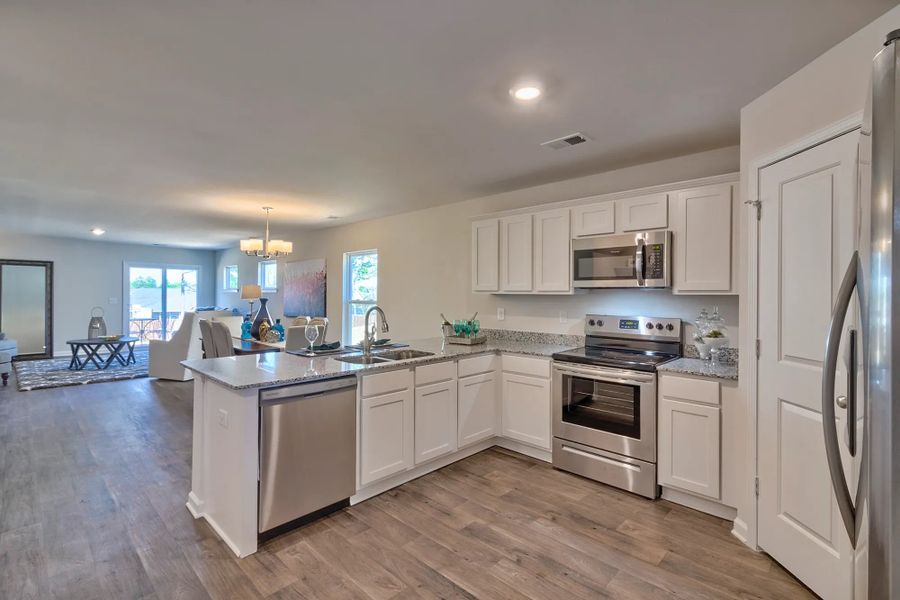 A showcase of a new construction home by McGuinn Homes, highlighting their design and quality (Image 8). A showcase of a new construction home by McGuinn Homes, highlighting their design and quality (Image 8).