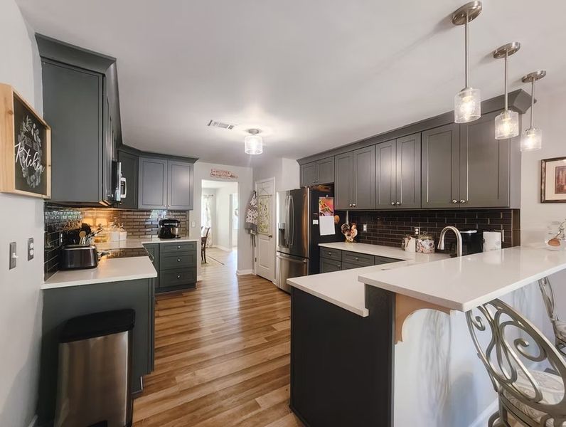 A showcase of a new construction home by Quality Family Homes, LLC, highlighting their design and quality (Image 10).