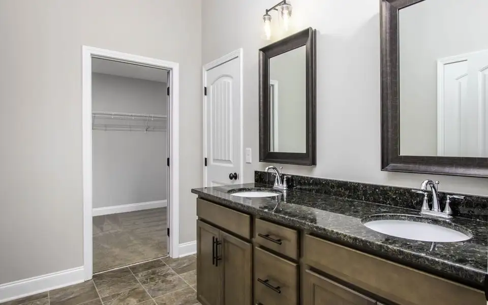 A showcase of a new construction home by Nason Homes, highlighting their design and quality (Image 11).