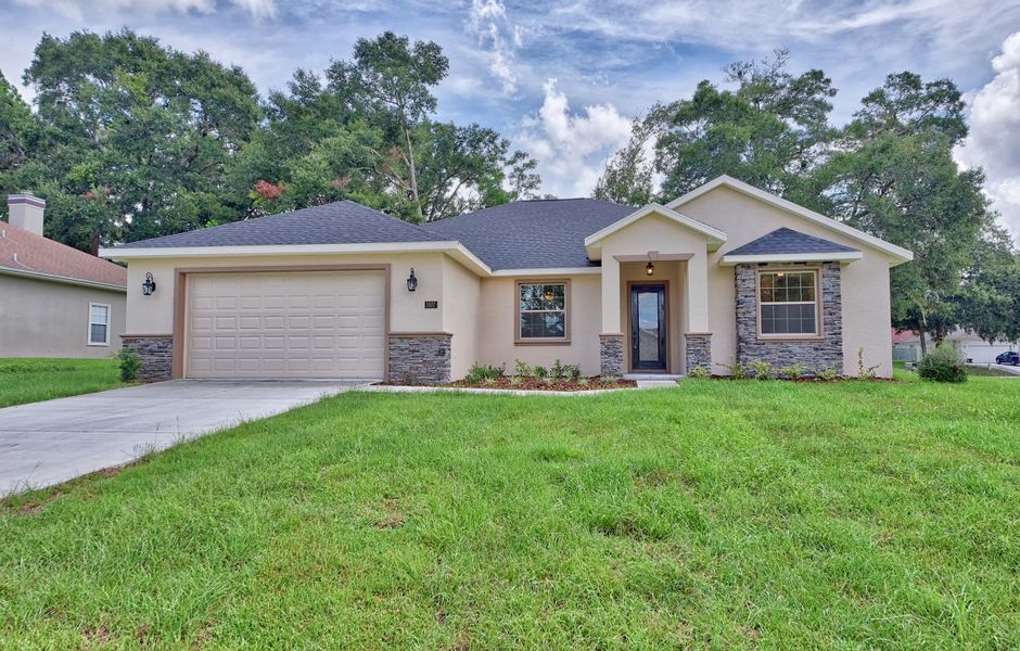 A showcase of a new construction home by Belac Homes, highlighting their design and quality (Image 1).