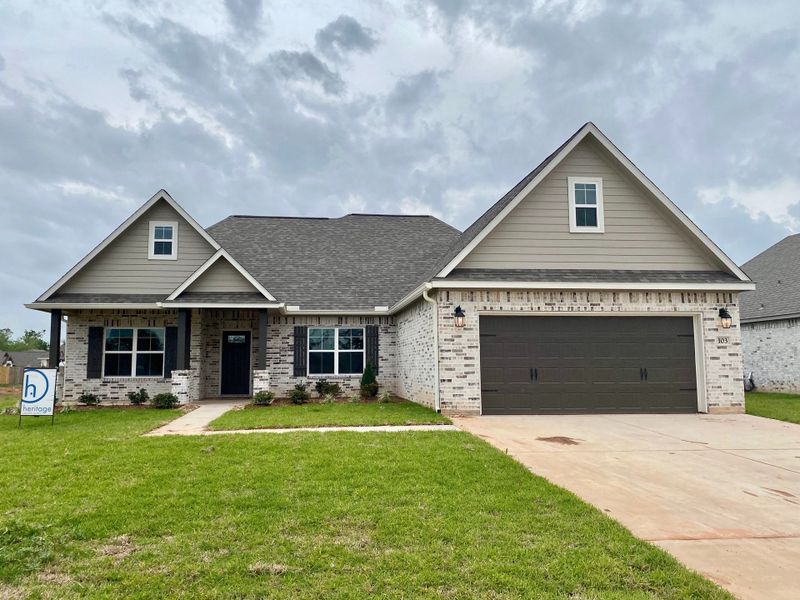 A showcase of a new construction home by Heritage Custom Home, highlighting their design and quality (Image 11).