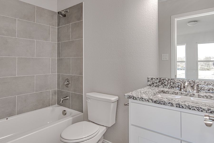 A showcase of a new construction home by NewPad Building Co., highlighting their design and quality (Image 12).