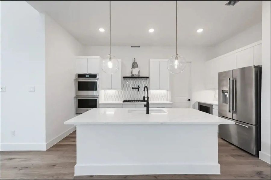 A showcase of a new construction home by Monarch Homes, highlighting their design and quality (Image 16).