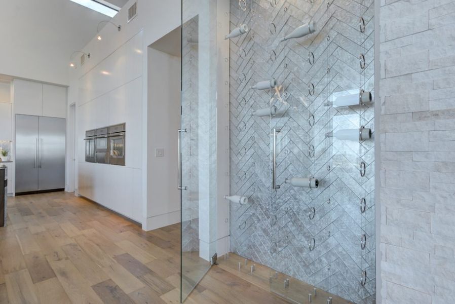 A showcase of a new construction home by Galleria Custom Homes, highlighting their design and quality (Image 4).