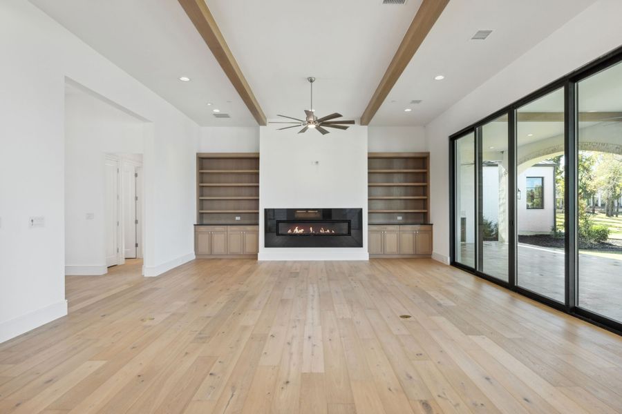 A showcase of a new construction home by Sharif & Munir Custom Homes, Inc., highlighting their design and quality (Image 6).