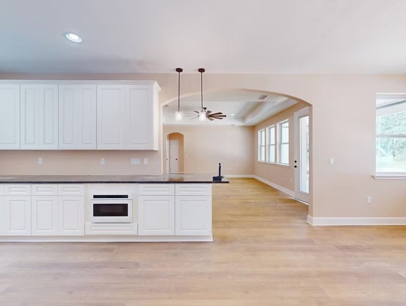 A showcase of a new construction home by Quality Family Homes, LLC, highlighting their design and quality (Image 5).