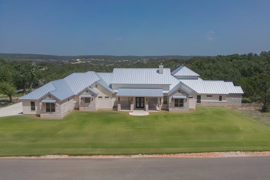 A showcase of a new construction home by KC Custom Homes, highlighting their design and quality (Image 1).