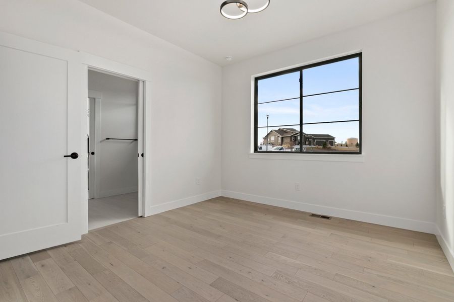 A showcase of a new construction home by New Vision Development Partners, highlighting their design and quality (Image 8).