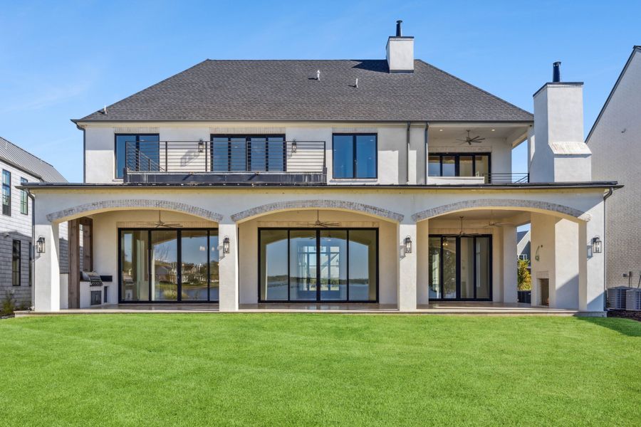 A showcase of a new construction home by Sharif & Munir Custom Homes, Inc., highlighting their design and quality (Image 5).