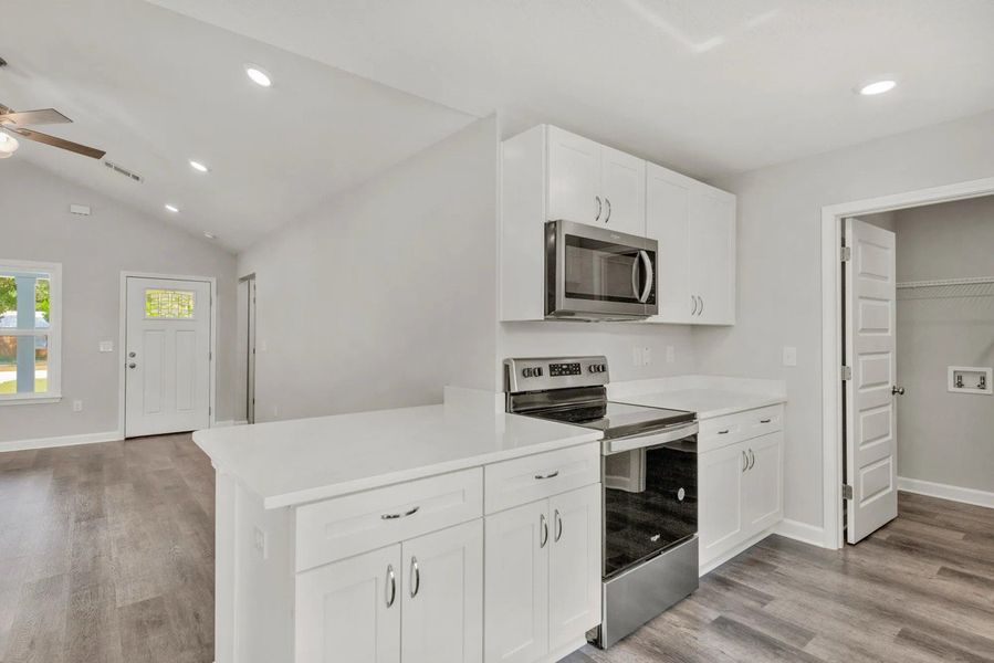 A showcase of a new construction home by CJL Homes, highlighting their design and quality (Image 13).