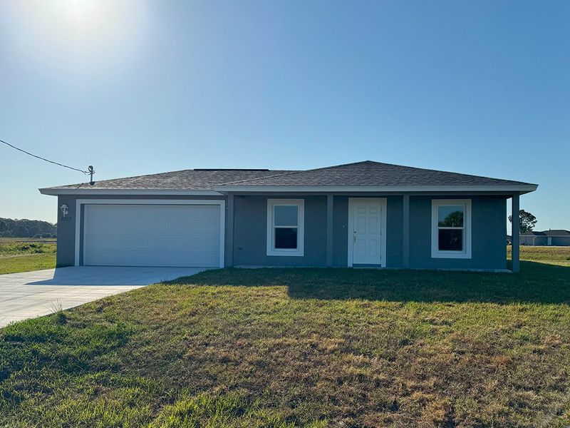 A showcase of a new construction home by Heartland Homes of Florida, highlighting their design and quality (Image 8).