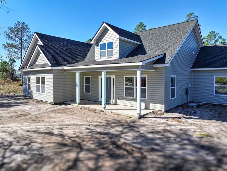 A showcase of a new construction home by Quality Family Homes, LLC, highlighting their design and quality (Image 4).