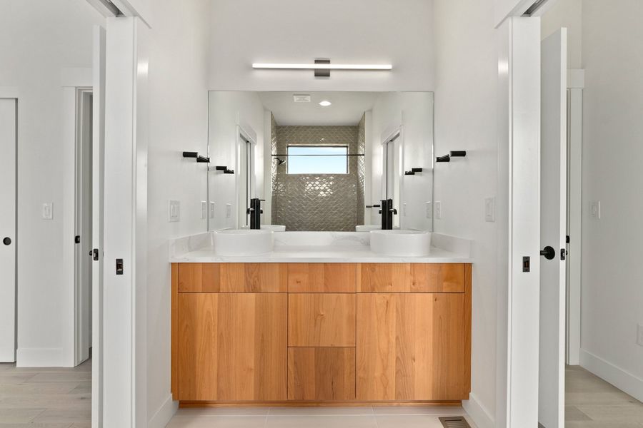 A showcase of a new construction home by New Vision Development Partners, highlighting their design and quality (Image 9).