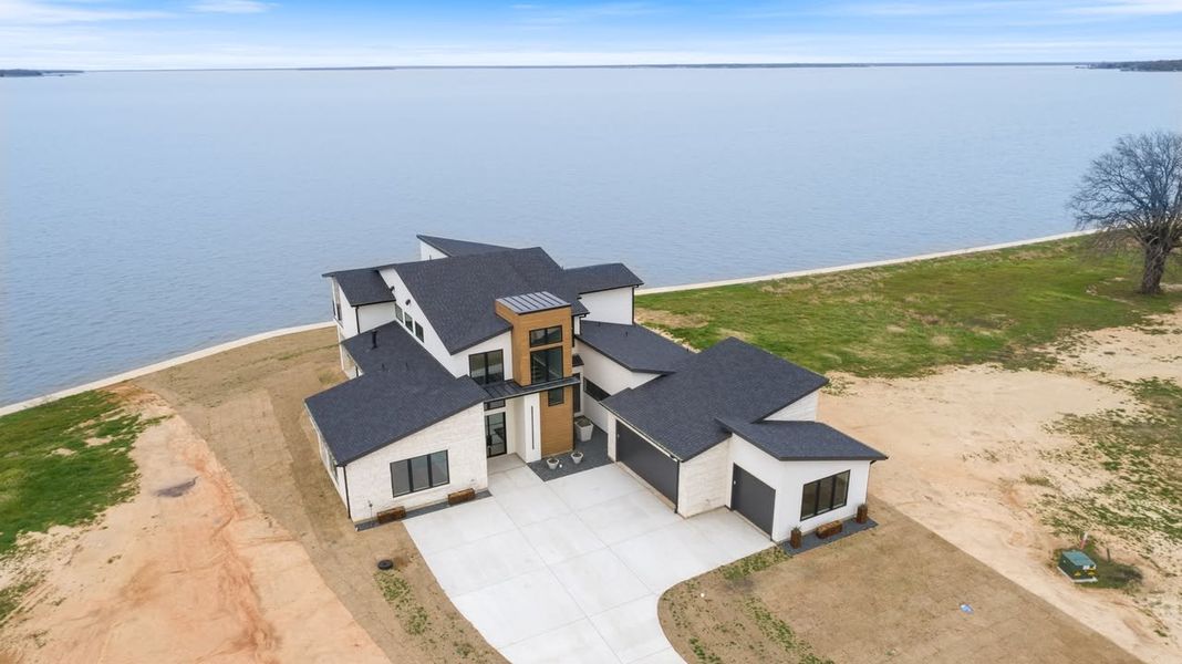 A showcase of a new construction home by Armor Custom Homes, highlighting their design and quality (Image 4).