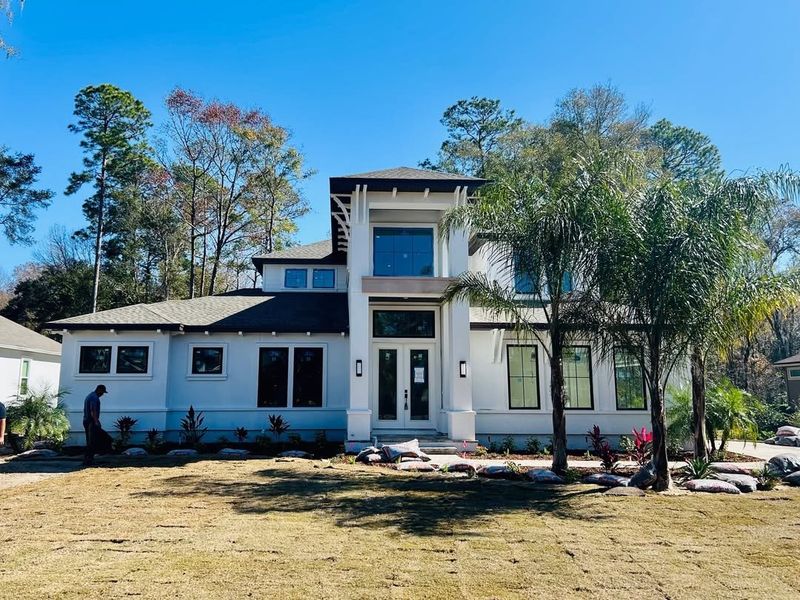 A showcase of a new construction home by Adele Designer Homes, highlighting their design and quality (Image 1).