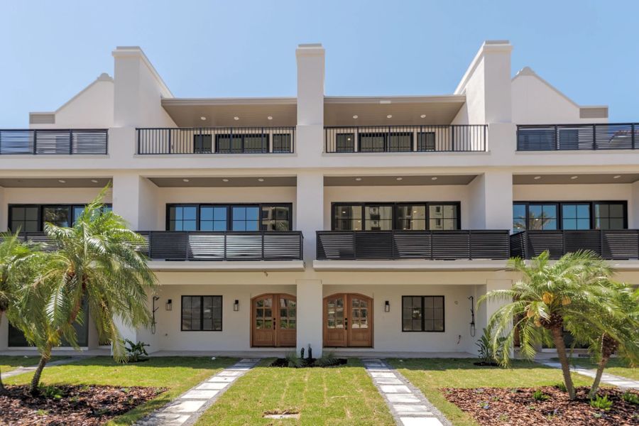 A showcase of a new construction home by Benchmark Commercial Group, highlighting their design and quality (Image 1).