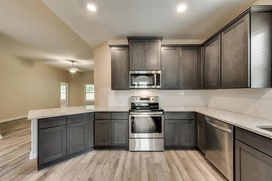 A showcase of a new construction home by ASGi Homess, highlighting their design and quality (Image 5).