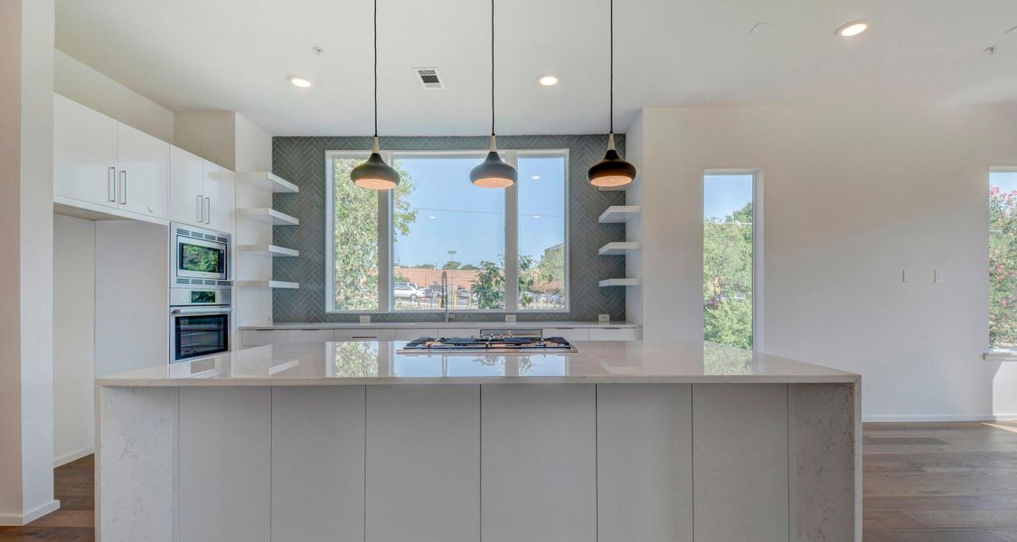 A showcase of a new construction home by FourT Realty, highlighting their design and quality (Image 4).