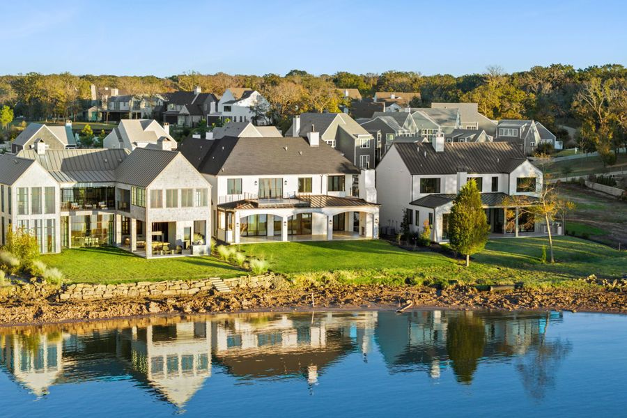 A showcase of a new construction home by Sharif & Munir Custom Homes, Inc., highlighting their design and quality (Image 1).