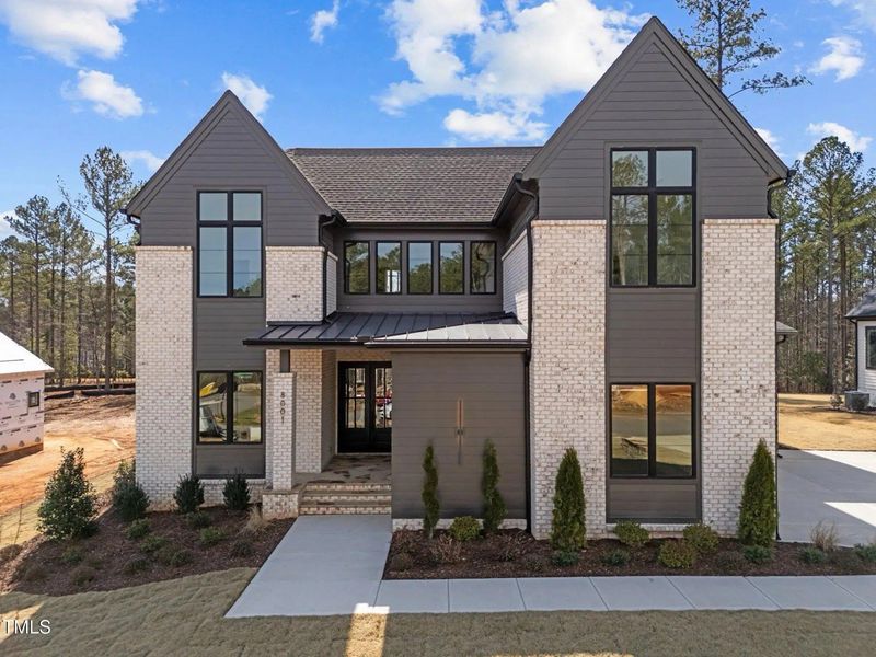A showcase of a new construction home by Bluestone Builders, highlighting their design and quality (Image 1). A showcase of a new construction home by Bluestone Builders, highlighting their design and quality (Image 1).