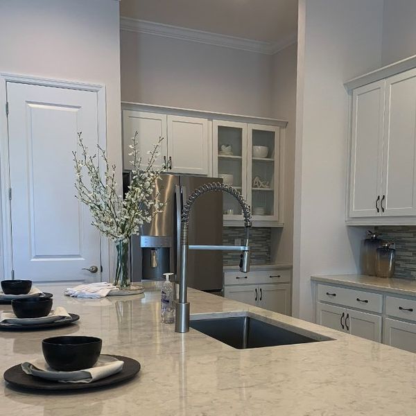 A showcase of a new construction home by Surrey Homes, highlighting their design and quality (Image 3). A showcase of a new construction home by Surrey Homes, highlighting their design and quality (Image 3).