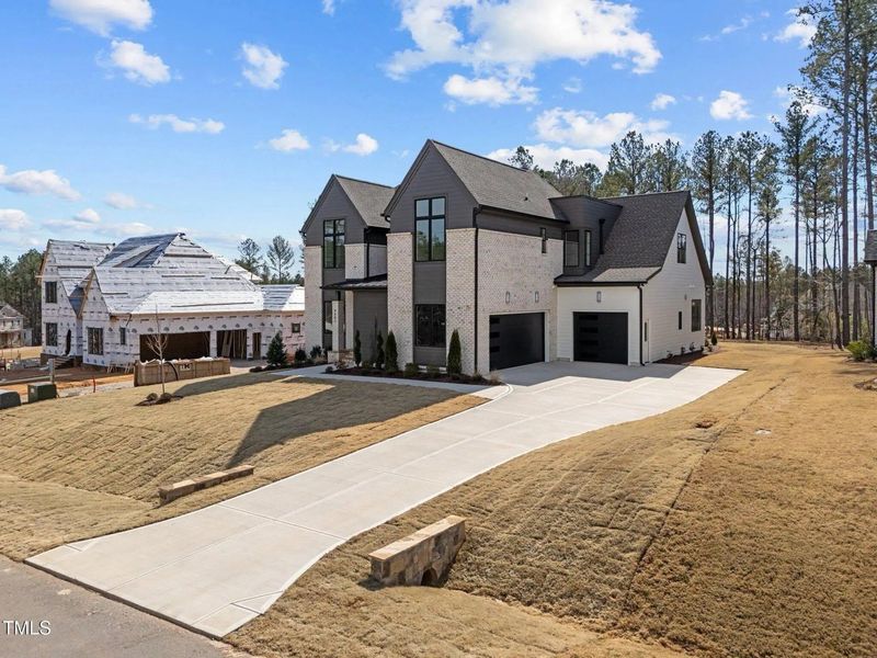 A showcase of a new construction home by Bluestone Builders, highlighting their design and quality (Image 2). A showcase of a new construction home by Bluestone Builders, highlighting their design and quality (Image 2).