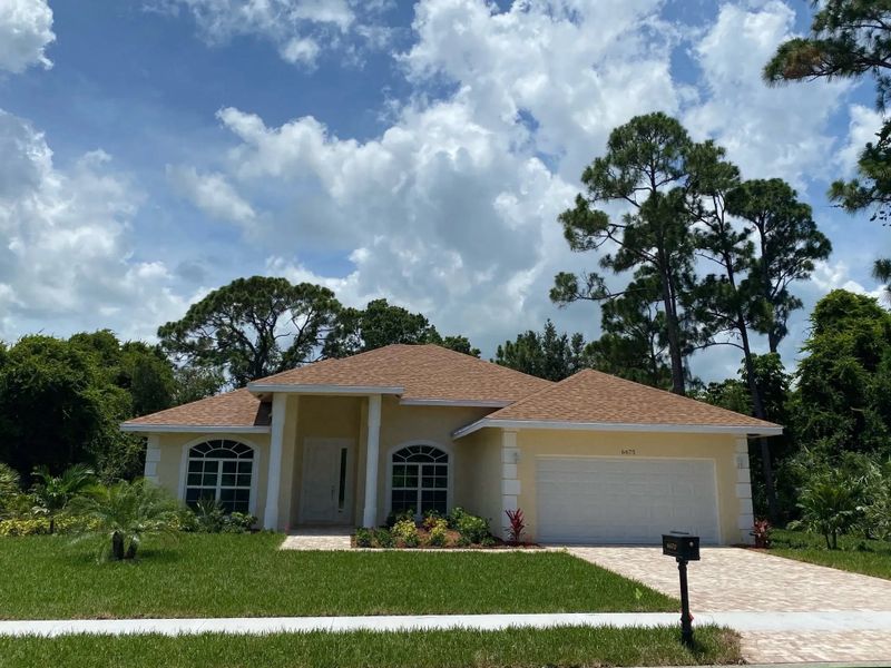 A showcase of a new construction home by Tudor Builders Inc, highlighting their design and quality (Image 1).