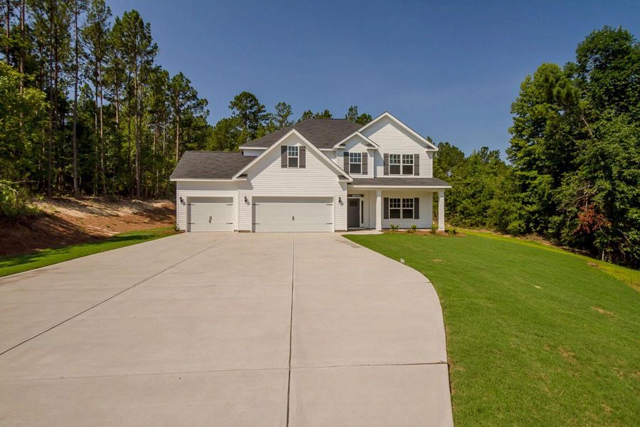 A showcase of a new construction home by Designer Homes of Georgia, highlighting their design and quality (Image 7). A showcase of a new construction home by Designer Homes of Georgia, highlighting their design and quality (Image 7).