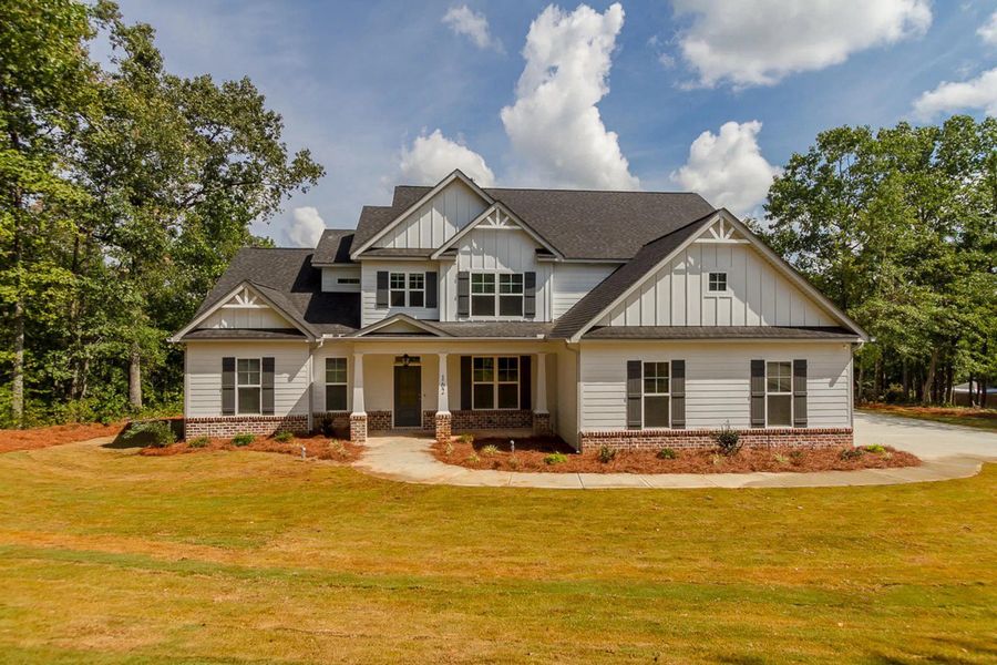 A showcase of a new construction home by Designer Homes of Georgia, highlighting their design and quality (Image 1). A showcase of a new construction home by Designer Homes of Georgia, highlighting their design and quality (Image 1).