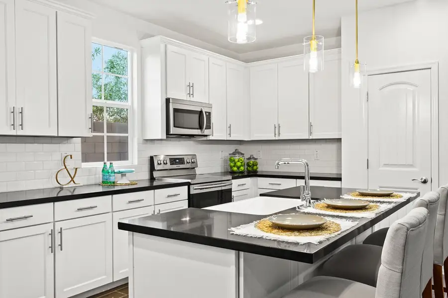 A showcase of a new construction home by Encanto Living, highlighting their design and quality (Image 12).