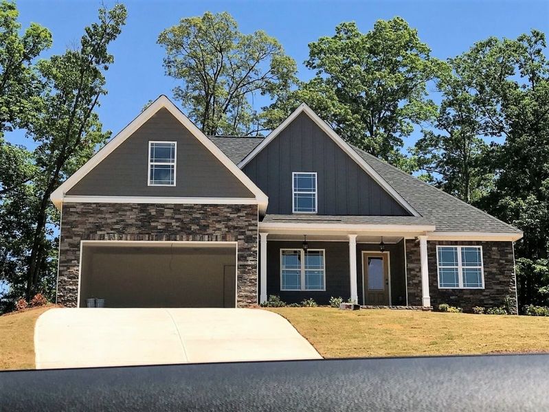 A showcase of a new construction home by Arbor Design Group, highlighting their design and quality (Image 8).