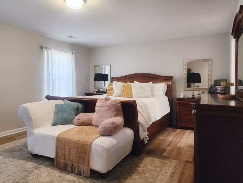 A showcase of a new construction home by Quality Family Homes, LLC, highlighting their design and quality (Image 7).