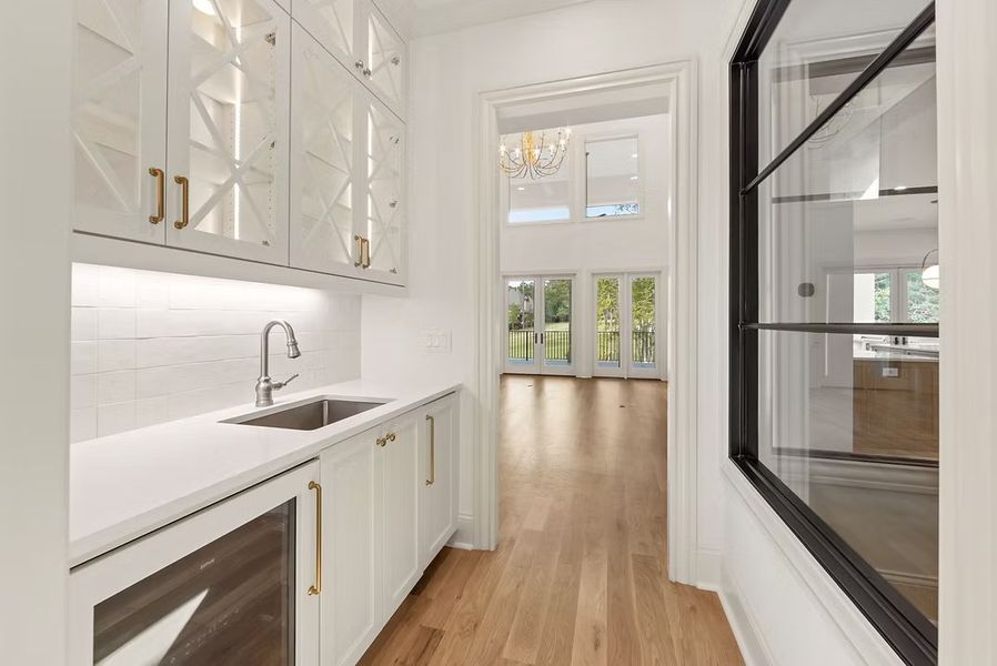 A showcase of a new construction home by Hyde Park Homes, Inc., highlighting their design and quality (Image 6).