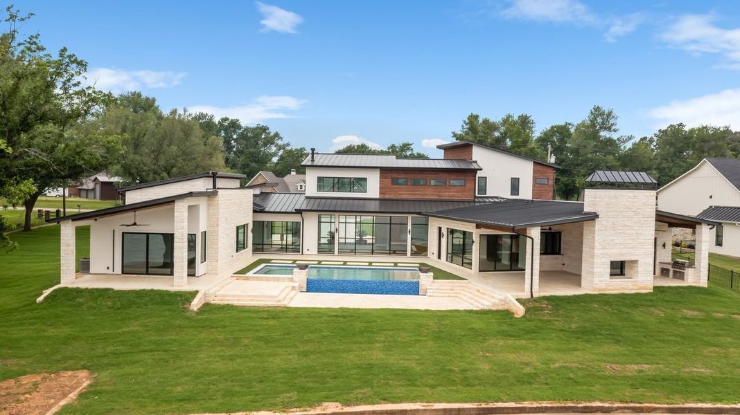 A showcase of a new construction home by Armor Custom Homes, highlighting their design and quality (Image 7).