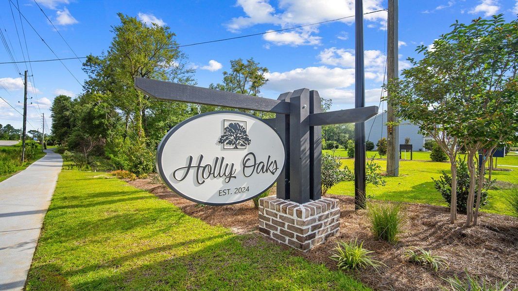 Entrance to the Holly Oaks community in Statesboro, GA, featuring signage and landscaping (Image 1).