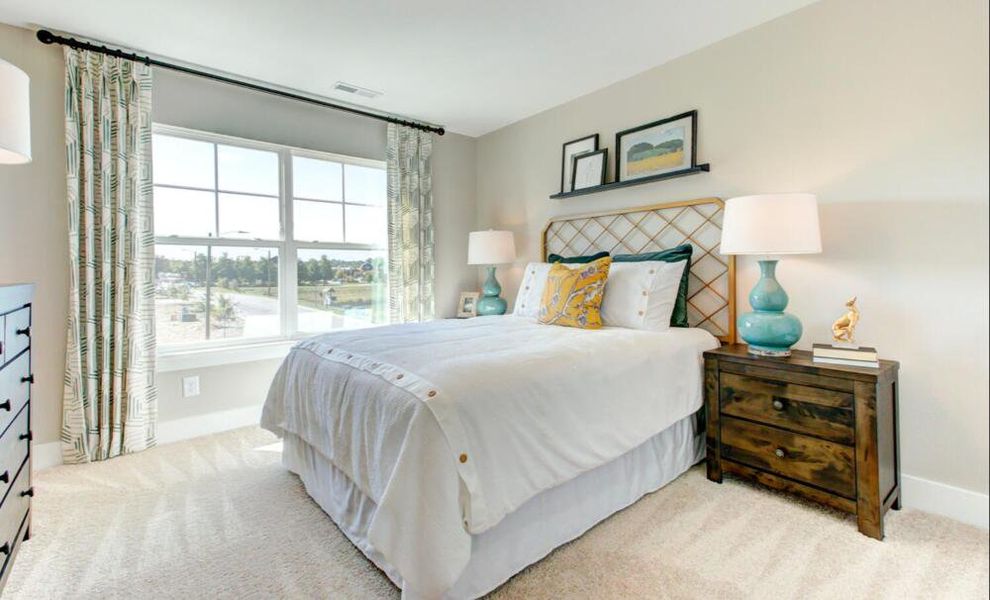 Furnished interior in a model home at CraigStone in Woodruff (Image 16).