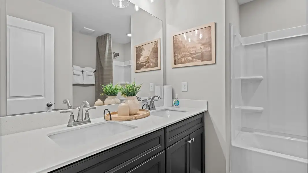 Furnished interior in a model home at Kensley Grove in Fuquay Varina (Image 13).