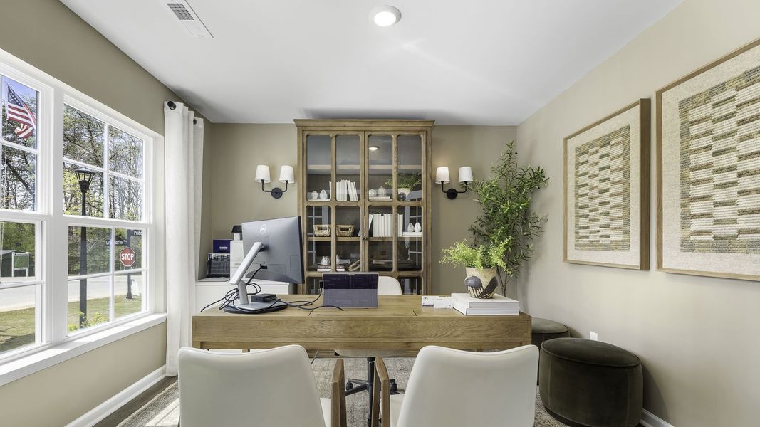 Furnished interior in a model home at Greystone North in Stoneville (Image 3). Furnished interior in a model home at Greystone North in Stoneville (Image 3).
