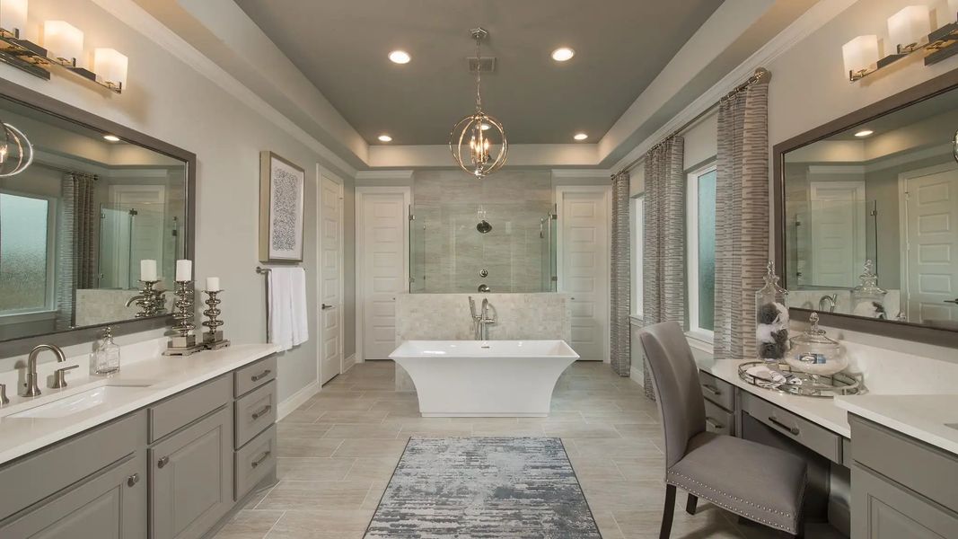 Furnished interior in a model home at Lakes Of Cane Island 80' in Katy (Image 5).