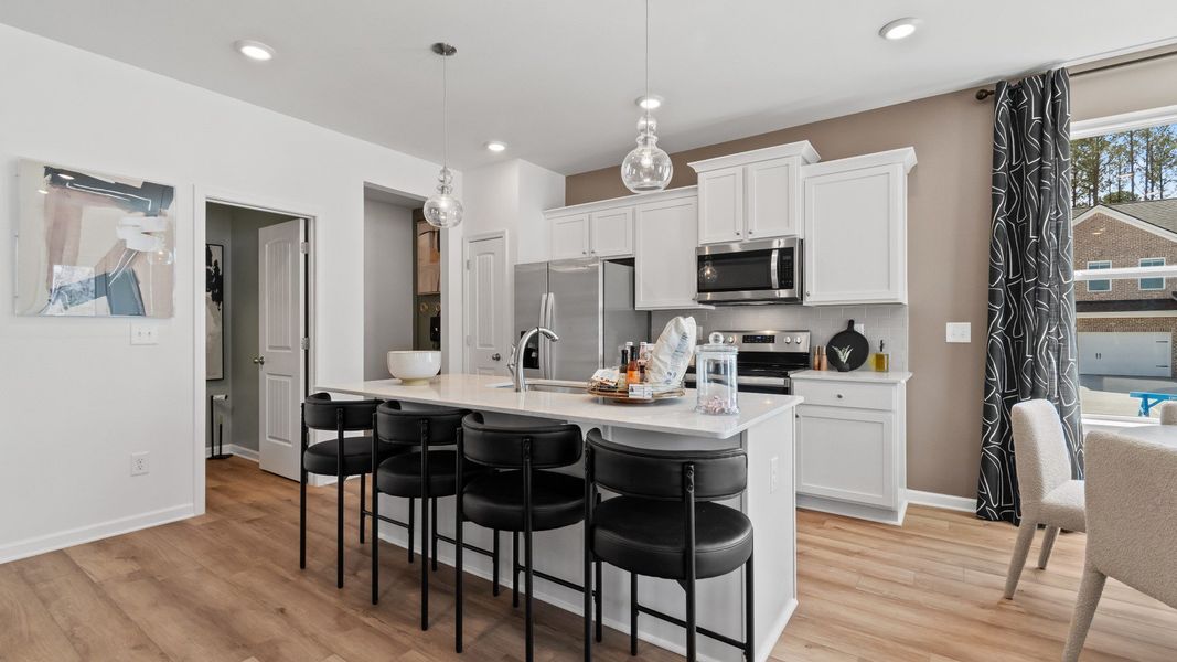 Furnished interior in a model home at Bowers Farm Townhomes in McDonough (Image 18).